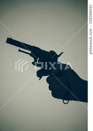 Gunman killer holding pistol artistic photo 108366091