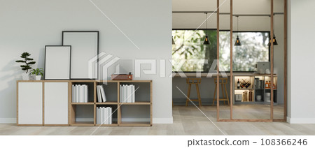 A modern, minimal room with blank frames mockup and a vinyl record player on a bookcase. A modern, minimal room with blank frames mockup and a vinyl record player on a bookcase. 108366246