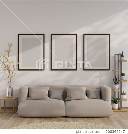 A modern, comfortable, Scandinavian living room with a comfy couch, frames mockup on the white wall. A modern, comfortable, Scandinavian living room with a comfy couch, frames mockup on the white wall. 108366247