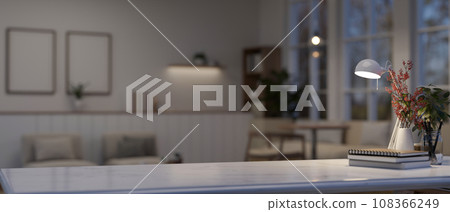 Copy space for displaying your product on a white tabletop in a minimal white living room at night. Copy space for displaying your product on a white tabletop in a minimal white living room at night. 108366249