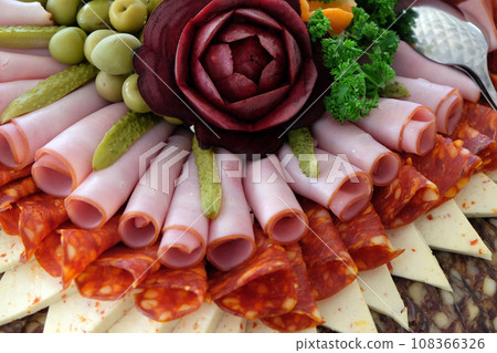 Classic Croatian starter plate with Fine Croatian ham, sliced salami and cheese 108366326