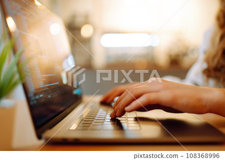 Female hands working on laptop, close-up. Technology, Freelance, online course, remote work concept. Female hands working on laptop, close-up. Technology, Freelance, online course, remote work concept. 108368996