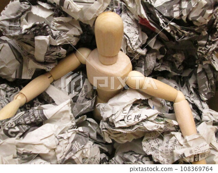 Drawing doll buried in garbage 108369764