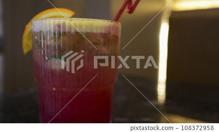 Virgin Strawberry mojito mocktail consist of soda water, strawberries, lime juice, sugar, mint leaves. 108372958