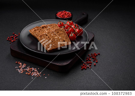 Delicious fresh crispy brown bread with seeds and grains Delicious fresh crispy brown bread with seeds and grains 108372983
