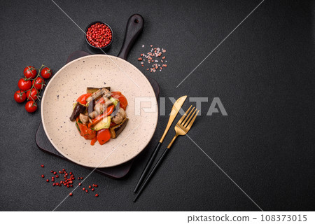 Delicious salad of grilled vegetables tomatoes, mushrooms, sweet peppers, eggplants 108373015