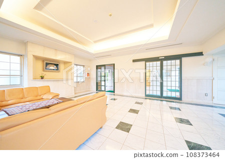 Interior image of the bright atmosphere of the entrance lobby of an apartment building Interior image of the bright atmosphere of the entrance lobby of an apartment building 108373464