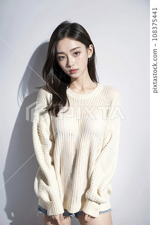一位穿著超大毛衣的黑髮女子（AI 生成的圖像） 108375441