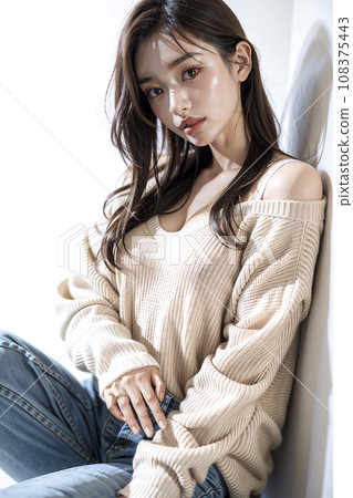 A black-haired woman wearing an oversized sweater (AI generated image) A black-haired woman wearing an oversized sweater (AI generated image) 108375443