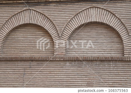 Arches on the exterior wall of a building. Arches on the exterior wall of a building. 108375563