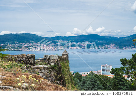 The view from the hill in Parque Monte del Castro, park located on a hill in Vigo, the biggest city in Galicia Region, in the North of Spain. View form the wall of the sea, selective focus 108375951