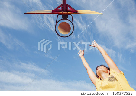 Sky's the Limit: Student Girl Shoots for Success in Basketball Glory 108377522