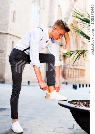 Man posing in gothic quarter of Barcelona 108378446