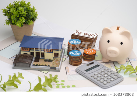 My home, floor plan, piggy bank, and calculator 108378808