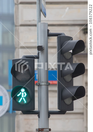 A traffic light on a clear day. A traffic light on a clear day. 108379222