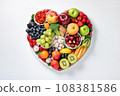 A vibrant heart-shaped platter filled with fresh fruits and vegetables for a colorful and healthy snack or meal. Perfect for those who prioritize nutrition and wellness. AI Generative. 108381586
