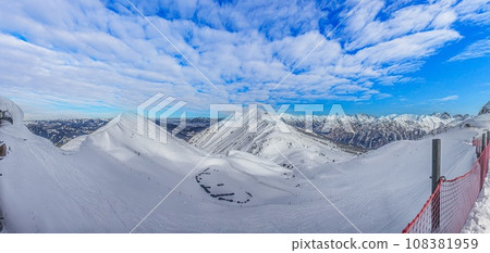 Panoramic image of a ski slope in Kanzelwand ski resort in Kleinwalsertal valley in Austria Panoramic image of a ski slope in Kanzelwand ski resort in Kleinwalsertal valley in Austria 108381959