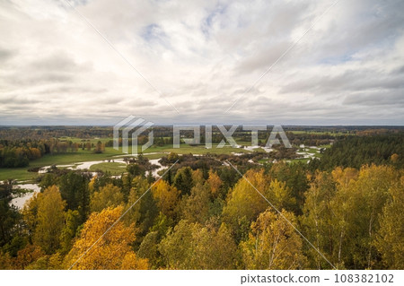 Nature of Estonia, colorful autumn deciduous forest, above view 108382102