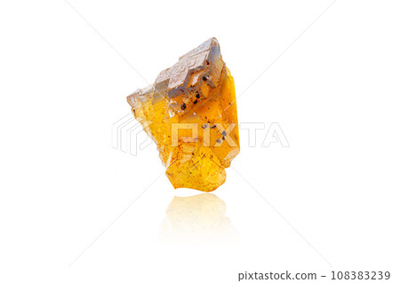 Macro mineral stone Fluorite yellow and blue color on a white background 108383239