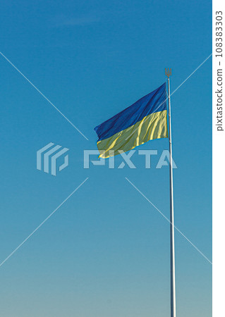 Ukrainian flag against the blue sky Ukrainian flag against the blue sky 108383303