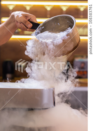 Smoke vapor dry ice in bowl in kitchen 108383761