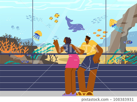 Young couple watching underwater life in oceanarium. Young couple watching underwater life in oceanarium. 108383931