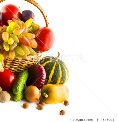 Set of vegetables and fruits in a basket isolated on a white. Free space for text. Set of vegetables and fruits in a basket isolated on a white. Free space for text. 108383994