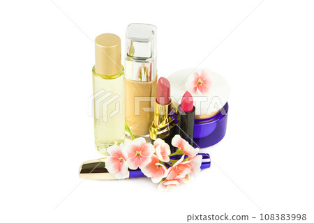 A set of decorative cosmetics and a bottle of perfume isolated on a white background. A set of decorative cosmetics and a bottle of perfume isolated on a white background. 108383998