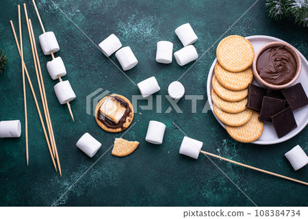 Smores with marshmallow, chocolate and crackers Smores with marshmallow, chocolate and crackers 108384734