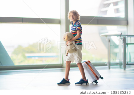Family in airport. Kids fly. Travel with child. 108385283