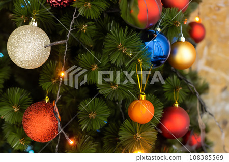 Christmas tree. Christmas 2023. Merry Christmas and New Year 2024. Greeting card design and sale banner with realistic composition of objects. Inside. magic glowing tree, fireplace and gifts. Light. Christmas tree. Christmas 2023. Merry Christmas and New Year 2024. Greeting card design and sale banner with realistic composition of objects. Inside. magic glowing tree, fireplace and gifts. Light. 108385569