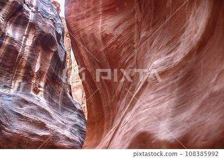 Kayon Sik. Close-up of the intricately shaped canyon walls and winding road. Petra Jordan 108385992