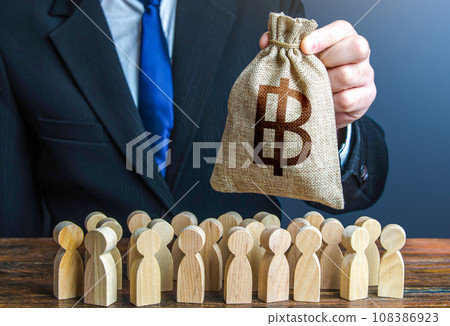 Businessman holds out a thai baht money bag to the crowd. Compensation payments. Providing money, paying salaries and grants. Official. Staff maintenance. Financial support. Tax collection. 108386923