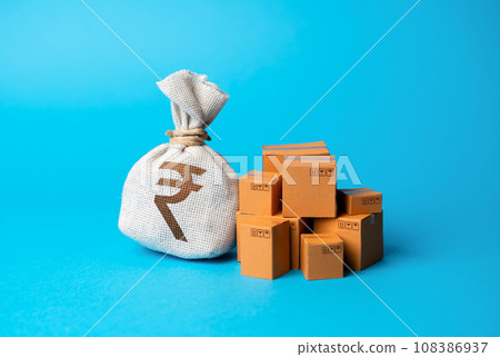 Goods boxes and indian rupee money bag. Budget purchases, large purchase orders. Global currency. Trade deal. Import and export. Profit from sales and production of goods, economic growth. Goods boxes and indian rupee money bag. Budget purchases, large purchase orders. Global currency. Trade deal. Import and export. Profit from sales and production of goods, economic growth. 108386937