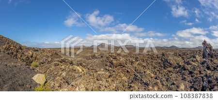 Panoramic view over the barren volcanic Timanfaya National Park on Lanzarote Panoramic view over the barren volcanic Timanfaya National Park on Lanzarote 108387838