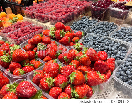 City market view with strawberries, heathberry and raspberry tasty colorfull look 108389330