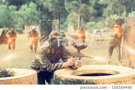 Team of friends paintball players playing together in battle 108389490