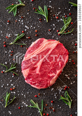 Uncooked rib eye steak 108389607