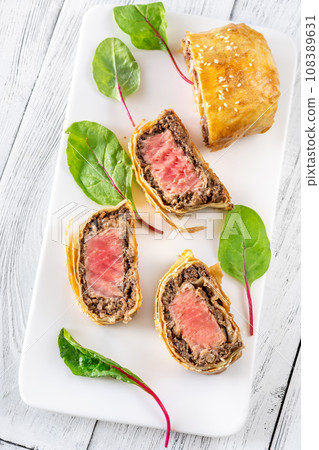 Portion of tuna wellington 108389631