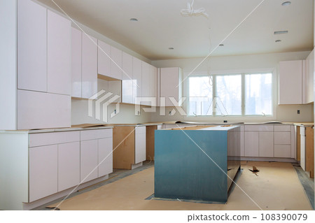 Worktop installation custom kitchen cabinets white color in new home 108390079