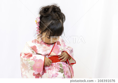 A girl wearing a Shichi-Go-San kimono (3 years old, Japanese) A girl wearing a Shichi-Go-San kimono (3 years old, Japanese) 108391076