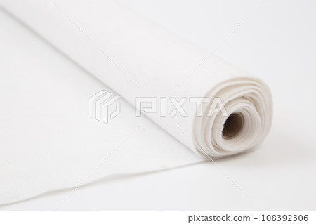 Roll of white Thick fabric on the white background Roll of white Thick fabric on the white background 108392306