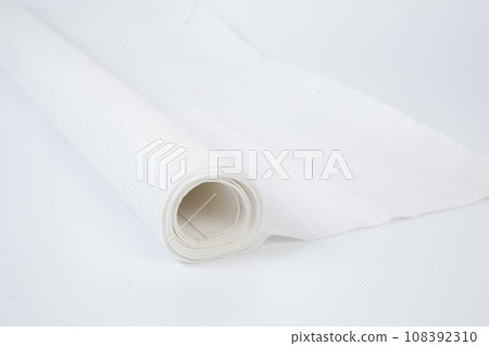 Roll of white Thick fabric on the white background Roll of white Thick fabric on the white background 108392310