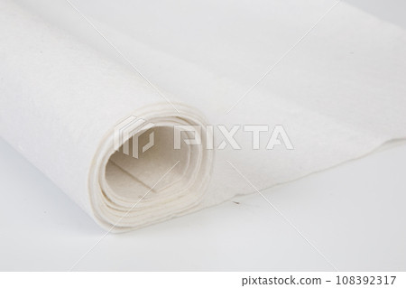 Roll of white Thick fabric on the white background Roll of white Thick fabric on the white background 108392317
