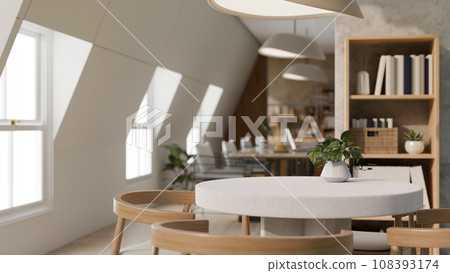 A beautiful, cosy office lounge or co-working space with a table. Empty mockup space on a table. 108393174