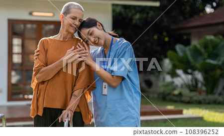 elderly touch hand on back of hand caregiver or nurses to express thankful 108396252
