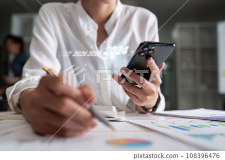 Analytical business people planning business growth 2024, strategy digital marketing, profit income Analytical business people planning business growth 2024, strategy digital marketing, profit income 108396476