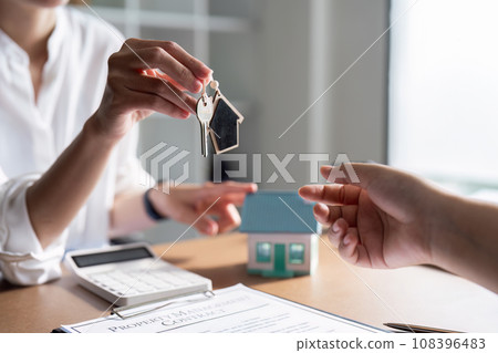 Real Estate Agent explain Property insurance and security concept about house to client before sign contract 108396483