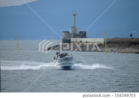 Omuta City Miike Port Fishing boat returning to the port, 108399703