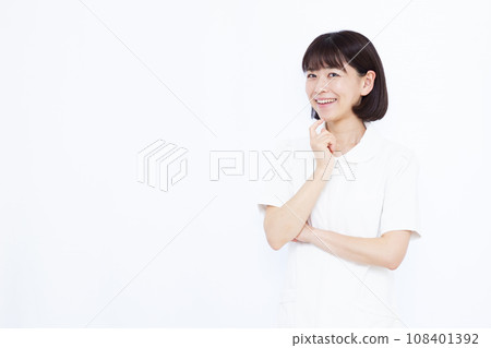 A nurse in her 30s who is worried about her smile 108401392